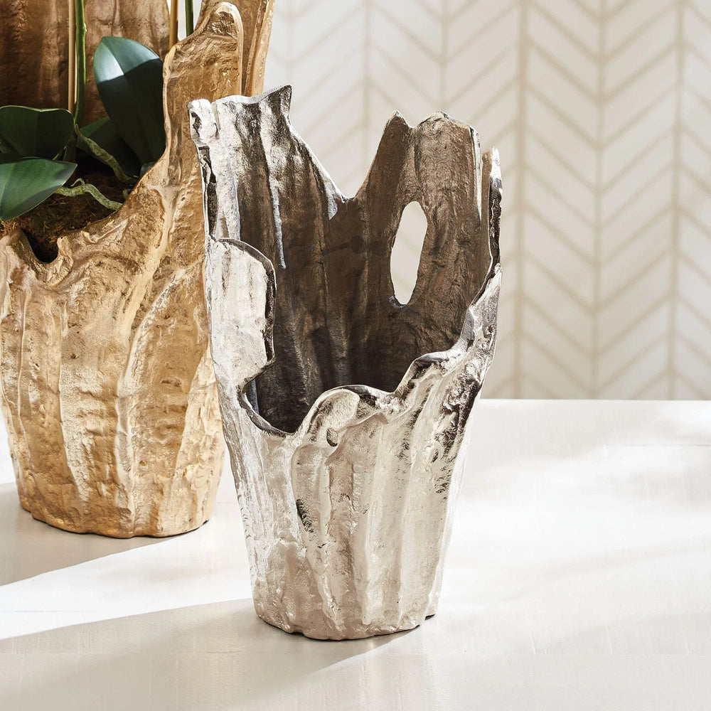 Silver aluminum decorative vase with organic rim, styled on white surface with gold vase in background – Modern Organic.