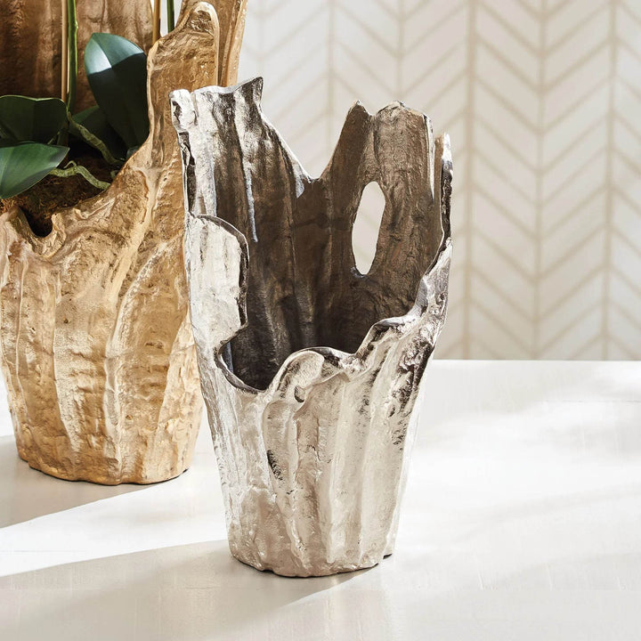 Silver aluminum decorative vase with organic rim, styled on white surface with gold vase in background – Modern Organic.