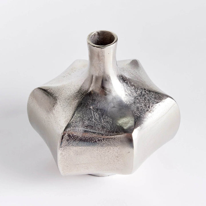 Top angle of small silver cast aluminum vase showing narrow neck and sculptural form, modern home styling

