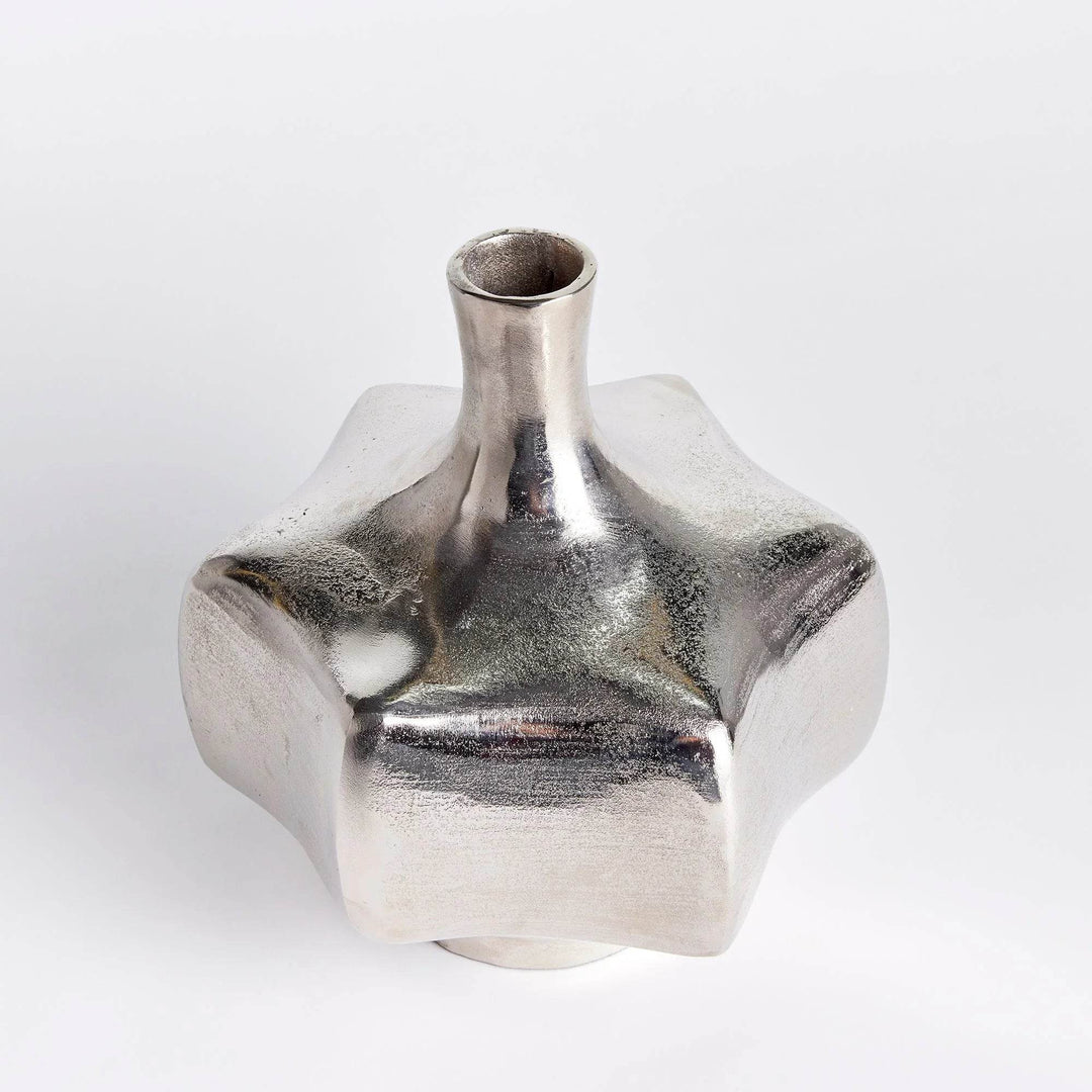 Top angle view of silver cast aluminum vase showing narrow neck and sculptural form, modern home decor accent

