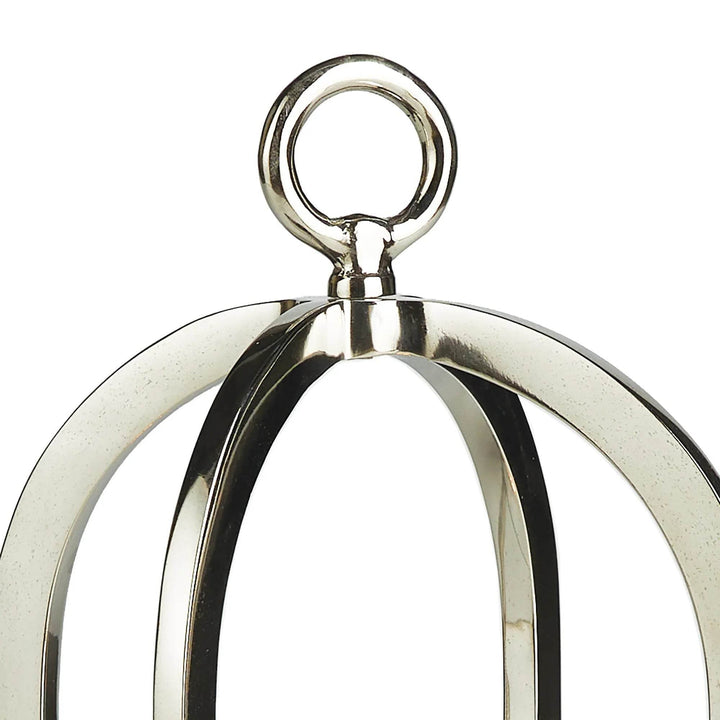 Close-up of polished silver lantern finial and arched aluminum frame with reflective finish – Modern Classic

