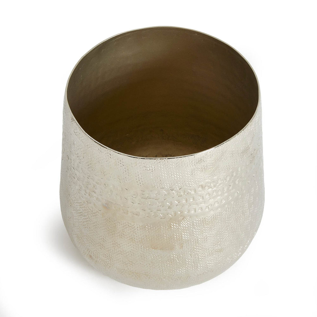 Top-down view of empty silver cachepot showing smooth interior and textured exterior – Modern Organic.

