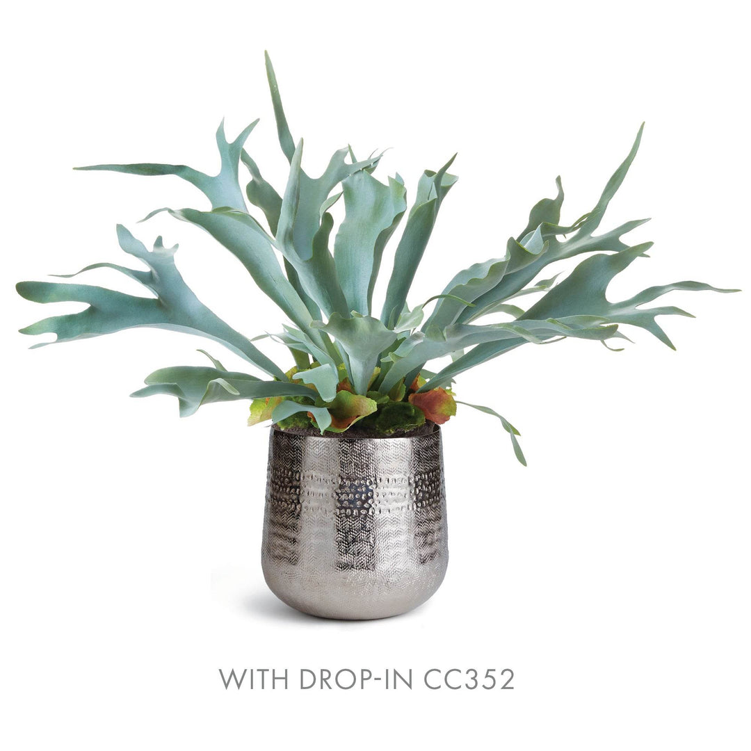 Silver cachepot styled with staghorn fern drop-in CC352, shown against white background – Modern Organic.

