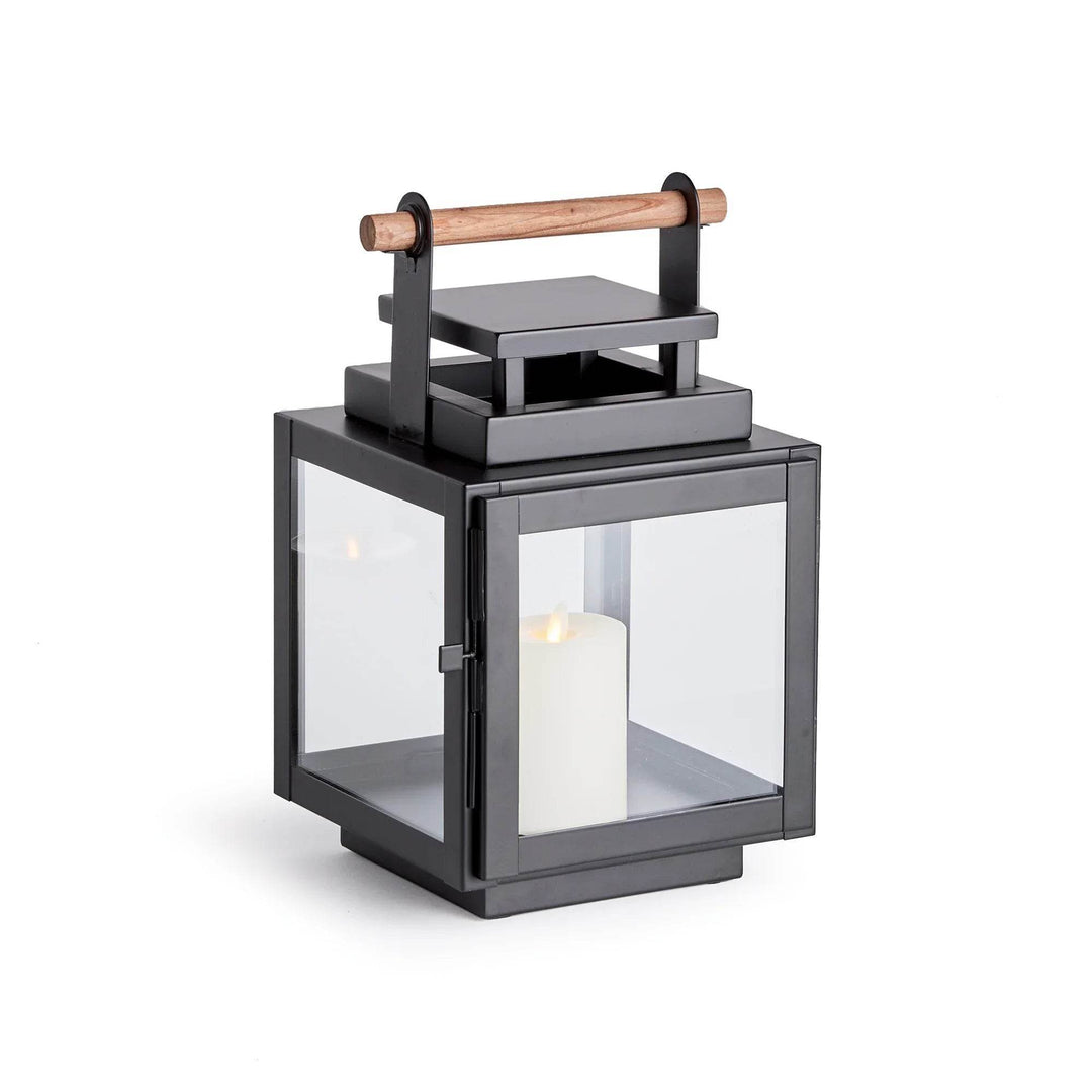 Small black outdoor lantern with teak handle and glass panels