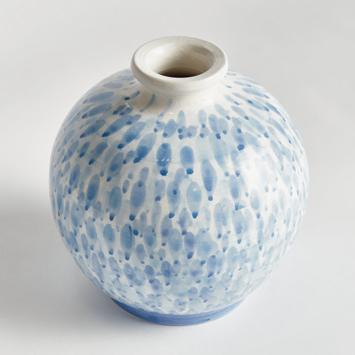Angled view of a small blue and white ceramic vase with round body, narrow opening and painted pattern, Coastal Transitional