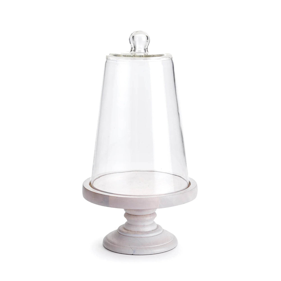 Small glass cloche with whitewashed wood pedestal base on white background