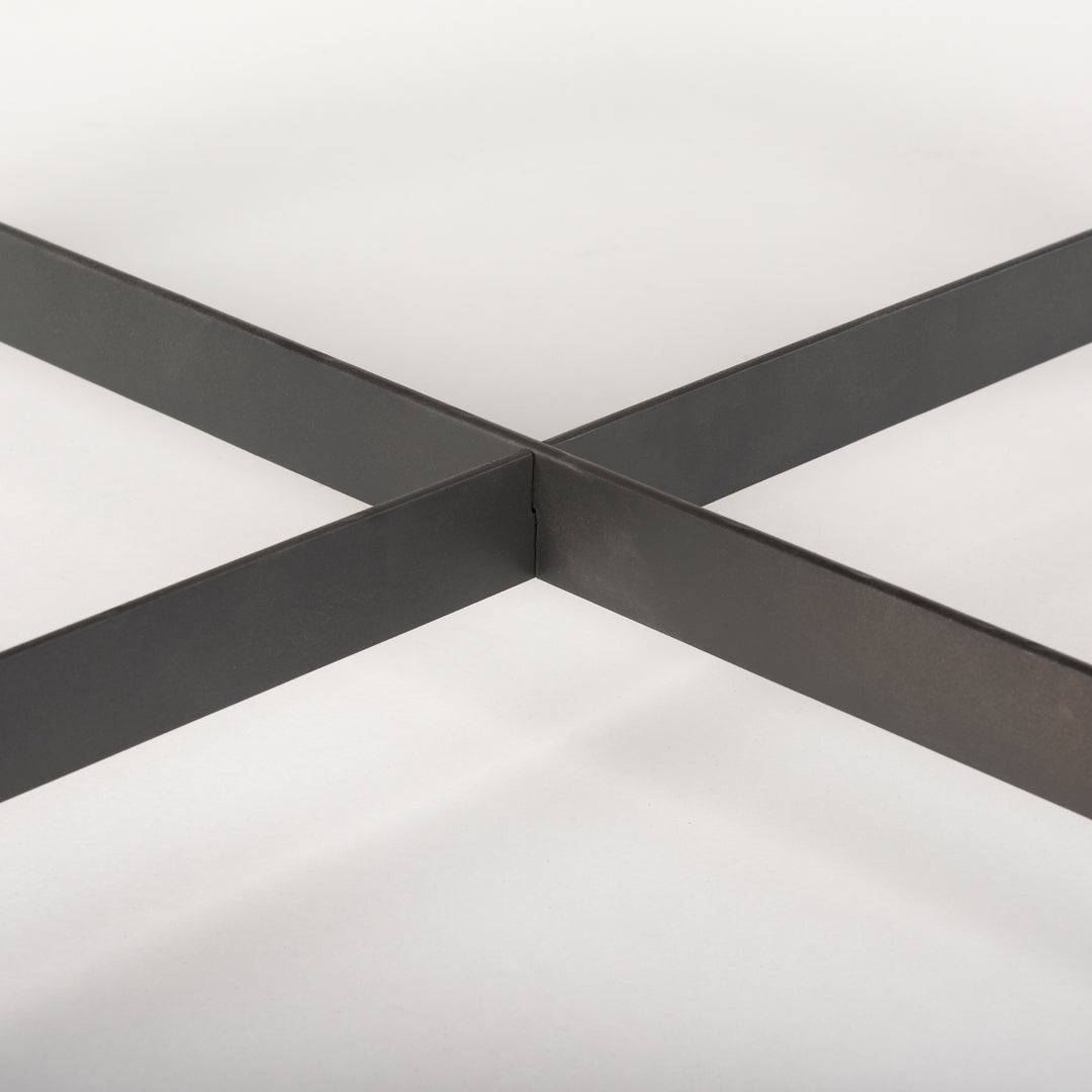 Close-up of the black iron cross-brace beneath the solid mango wood tabletop showing structural support, Modern Organic coffee table