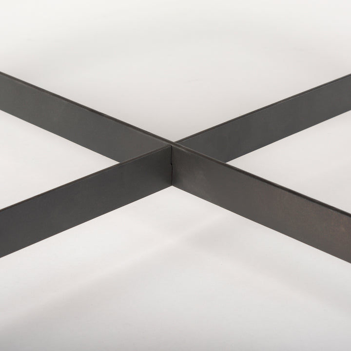Close-up of the black iron cross-brace beneath the solid mango wood tabletop showing structural support, Modern Organic coffee table