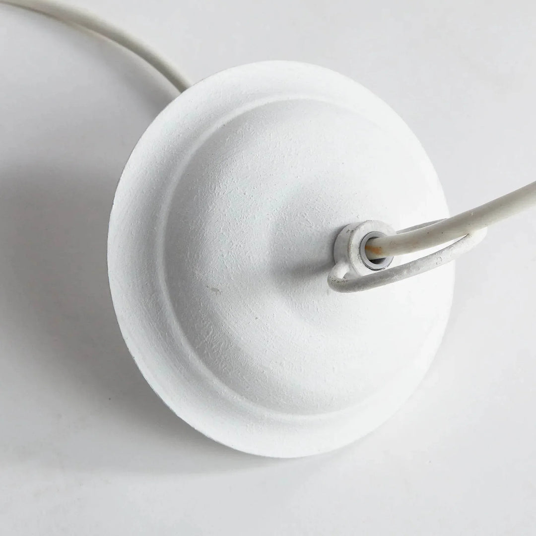 Small white pendant ceiling canopy viewed from above, with a round plate and central cable connection, Modern Farmhouse style