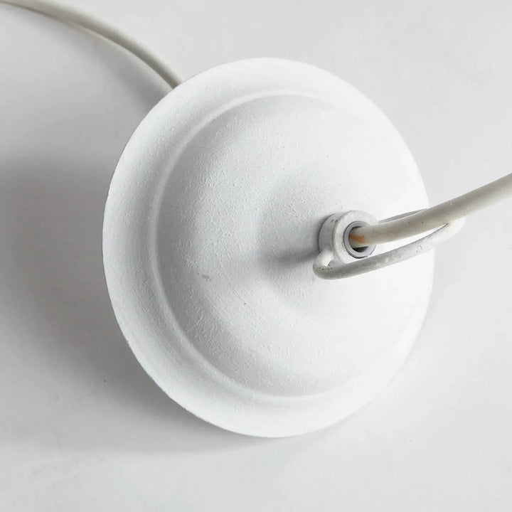 Small white pendant ceiling canopy viewed from above, with a round plate and central cable connection, Modern Farmhouse style