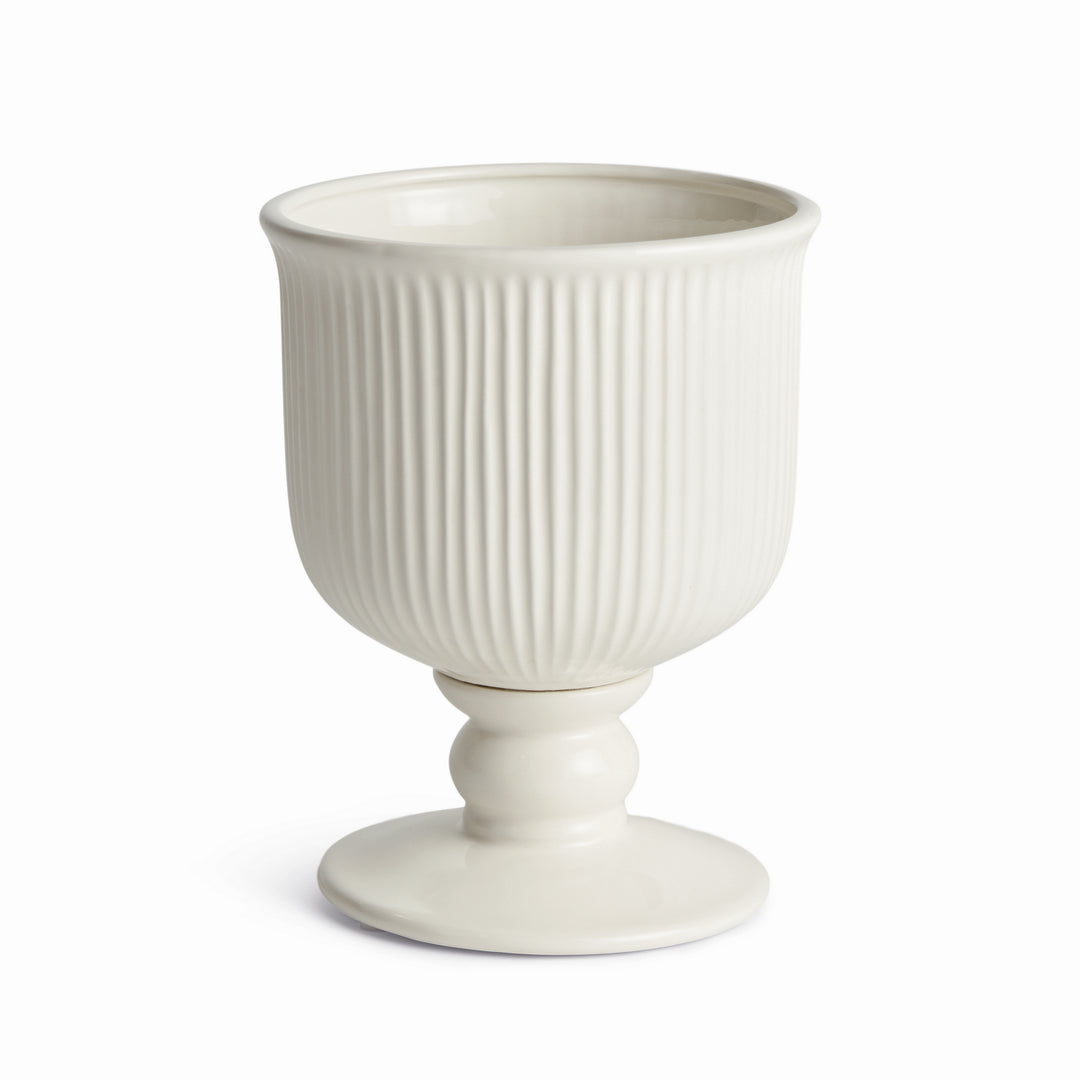 Small white ceramic footed cachepot showing fine vertical ribbing, rounded body and a circular pedestal base, Traditional
