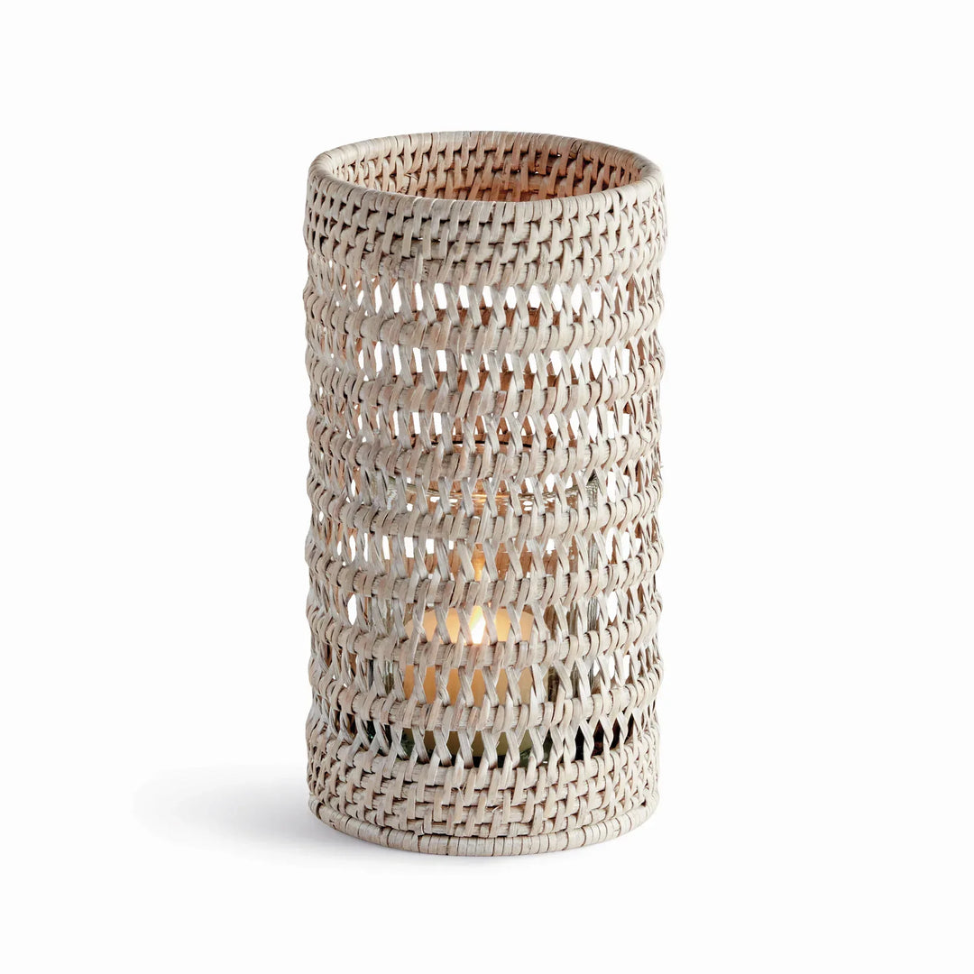 Small whitewash handwoven rattan hurricane candleholder with open cylindrical body and glass insert, on white, Transitional