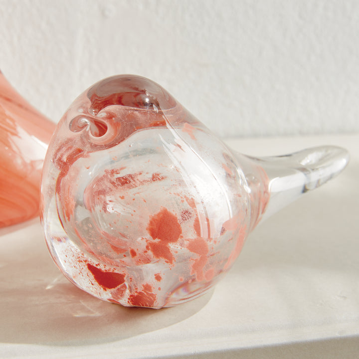 Single speckled melon glass finch sculpture with rounded form and glossy finish, decorative bird for tabletop display.