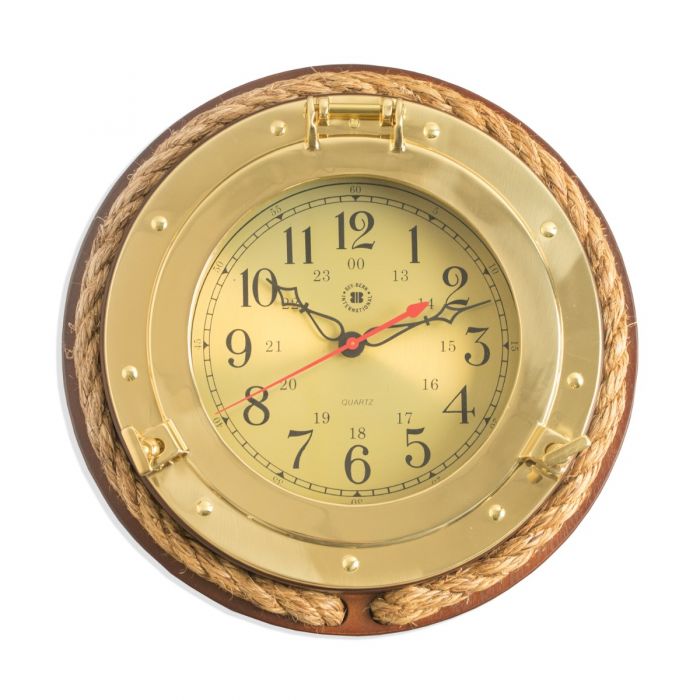 This nautical themed wall clock is crafted from dark cherry wood and solid brass, making it a durable and stylish addition to your living room decor. The porthole design and fisherman's rope accent adds a touch of charm, while the quartz clock ensures accurate timekeeping. Easily mount this clock on your wall for a functional and decorative piece.