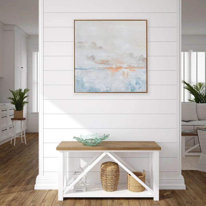 39-inch square abstract wall art with gold frame styled above console table in bright entryway – Modern Coastal