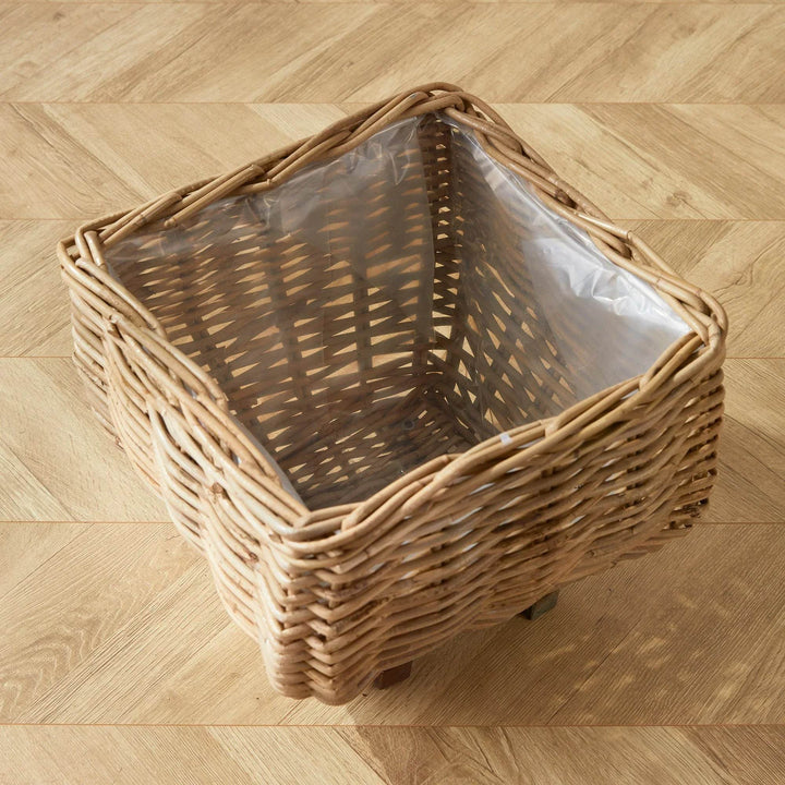 Top view of square rattan planter basket with clear liner, showing interior space for indoor planting or styling in home – Casual Coastal.

