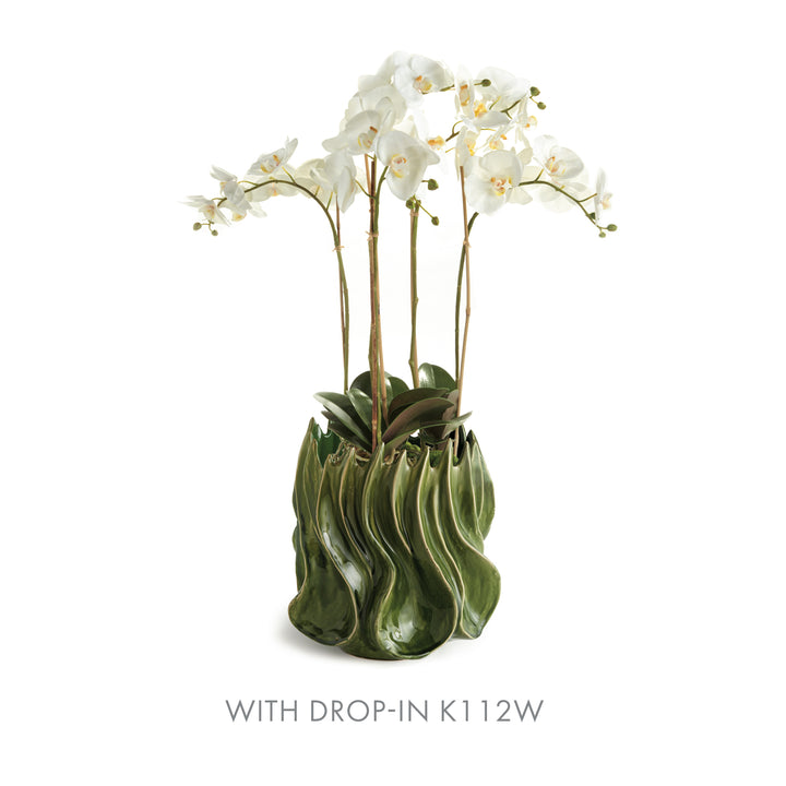 Sylva large green ceramic vase with an arching white orchid arrangement against a plain white background. Modern Organic
