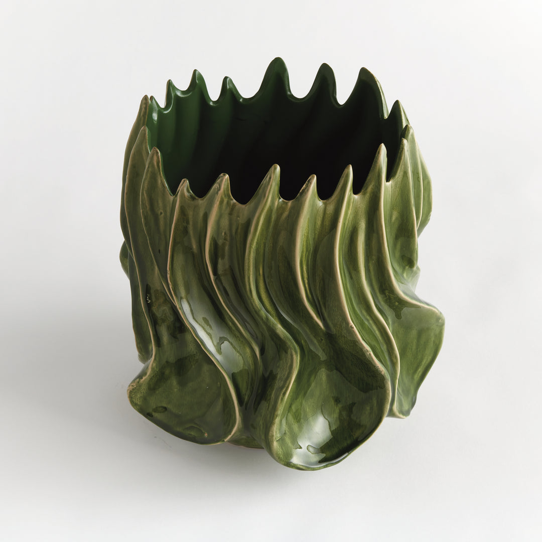 Angled view of Sylva large green vase showing its open pointed rim and sculptural body on a pale background. Modern Organic