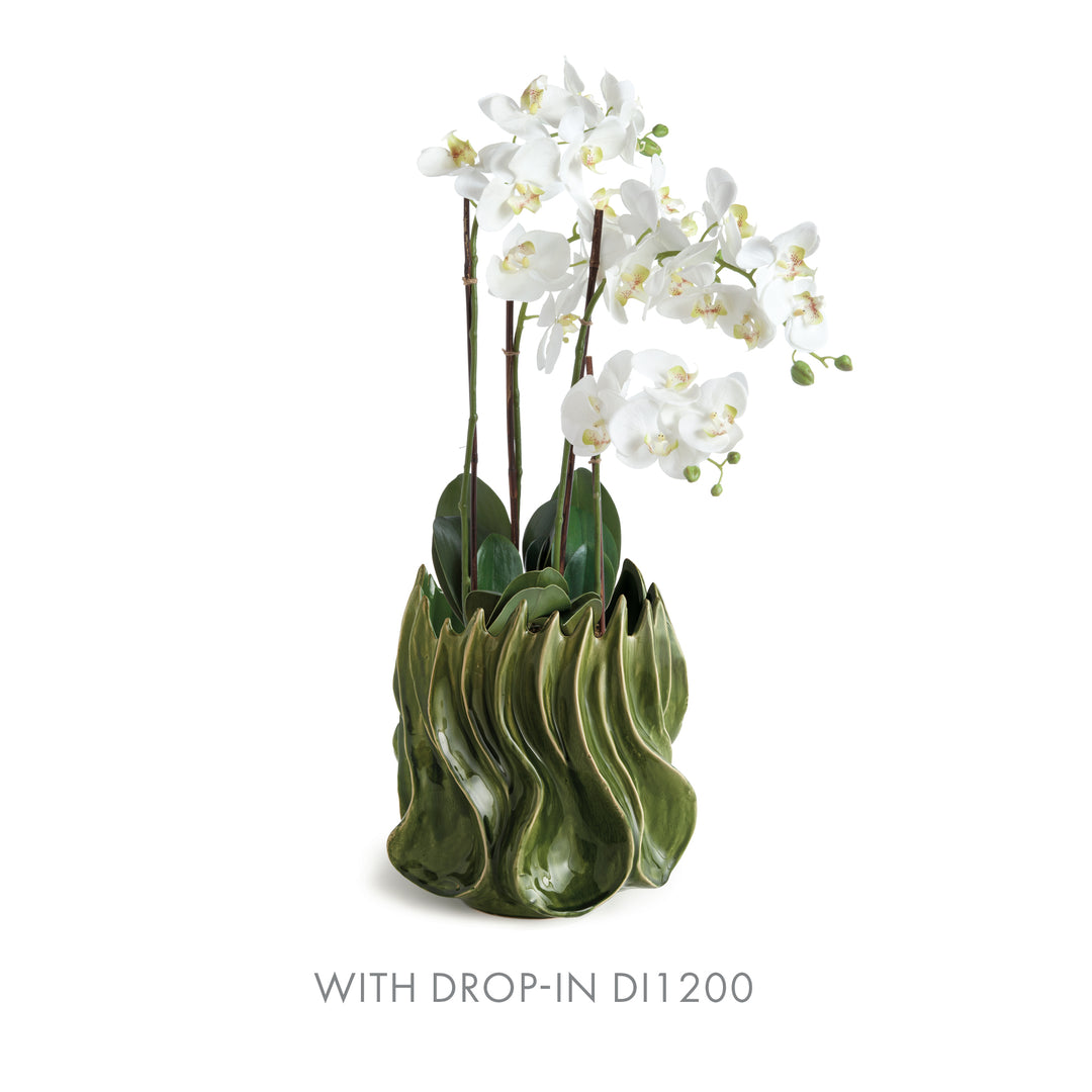 Sylva large green vase with a tall white orchid drop-in and green leaves against a plain white background. Modern Organic