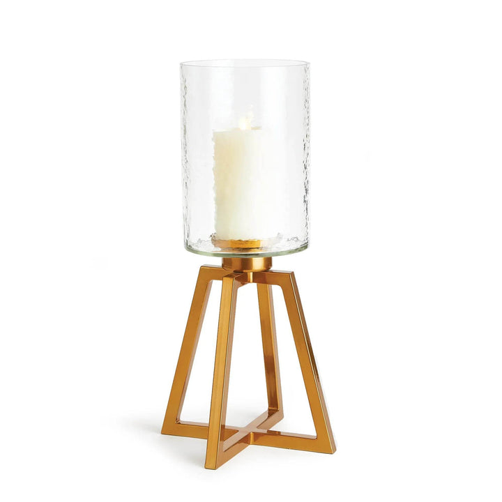 Tall glass hurricane with hammered glass cylinder and gold metal base, shown with lit candle – Industrial Modern

