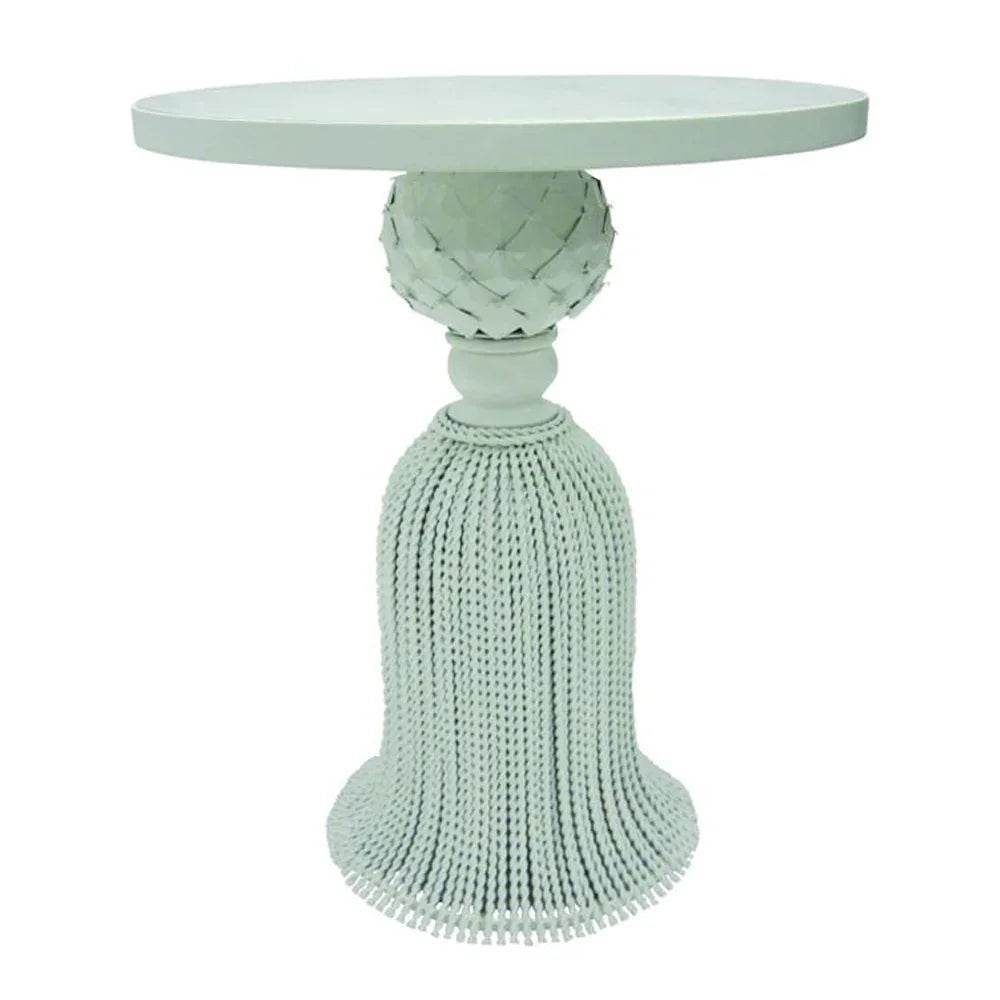 White tassel side table with pineapple accent and skirted base

