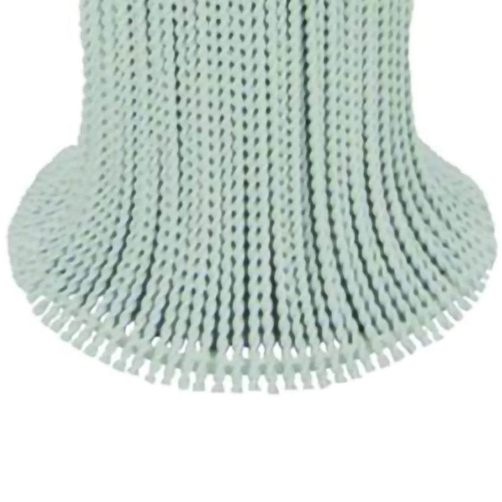 Skirt base detail on white tassel side table

