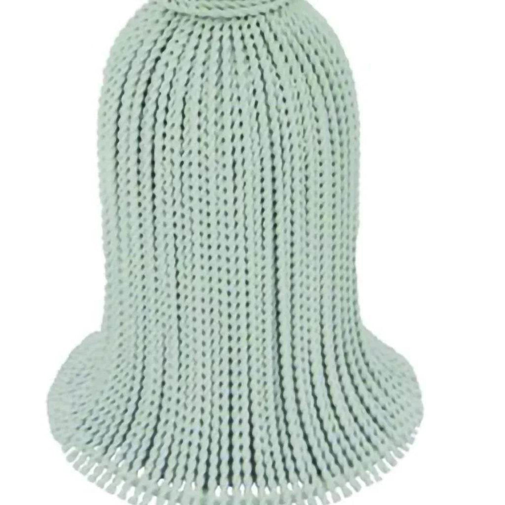 Skirt design detail on white tassel side table

