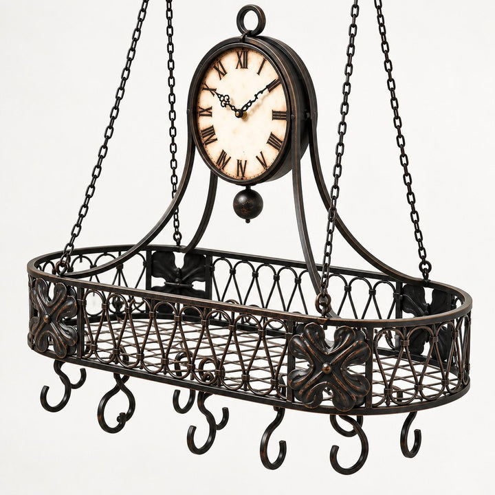 Three-quarter view of vintage black metal hanging wall clock with basket and hooks
