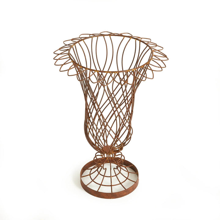 Side view of tall weathered wire vase in studio lighting, showing woven iron details – Vintage Farmhouse style