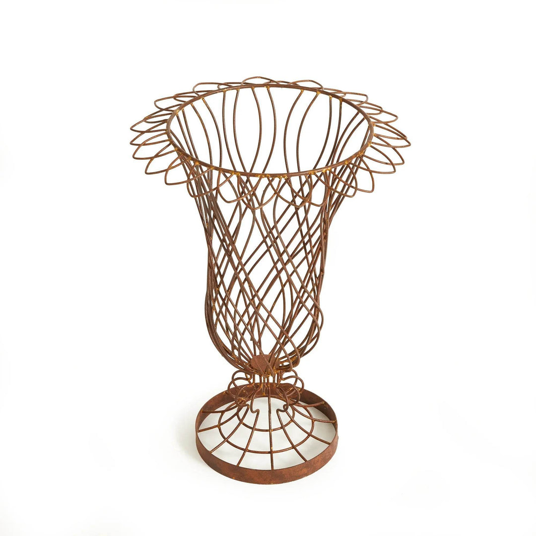 Side view of tall weathered wire vase in studio lighting, showing woven iron details – Vintage Farmhouse style
