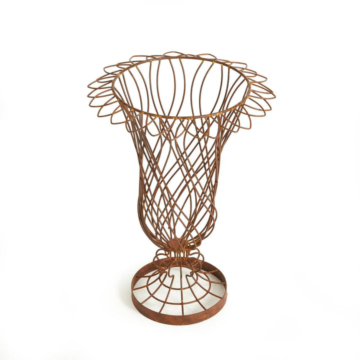 Side view of tall weathered wire vase in studio lighting, showing woven iron details – Vintage Farmhouse style