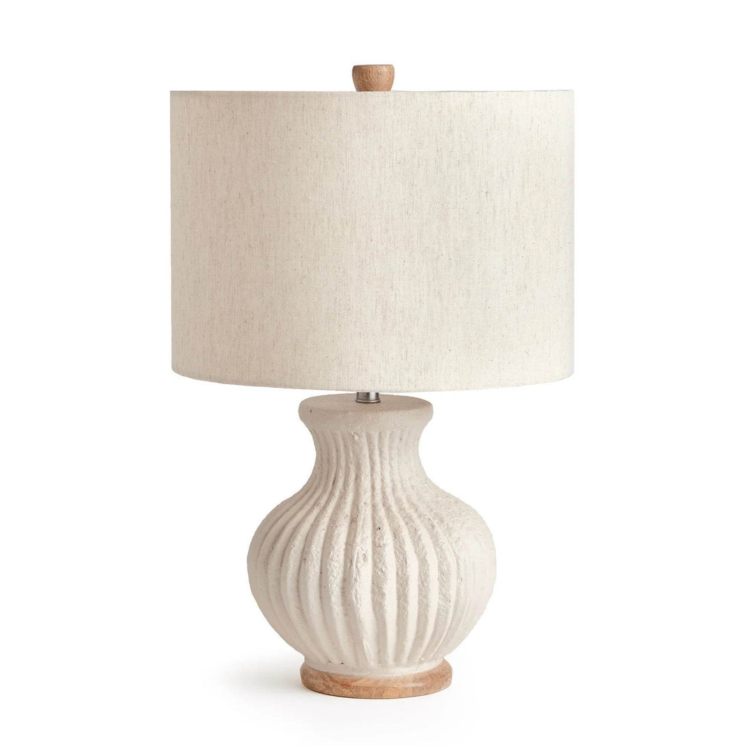Front view of handcrafted wabi sabi lamp in cream with ribbed base and linen shade, centered on white background