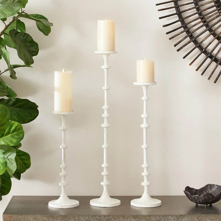 Close-up of white pillar candle stand showing notched abacus stem and round base texture for subtle handcrafted dimension – Modern Farmhouse.