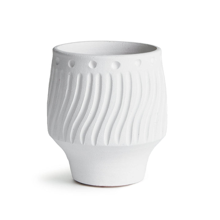 Matte white ceramic cachepot planter with carved surface and footless base for drop-ins or shelf styling – Modern Organic.

