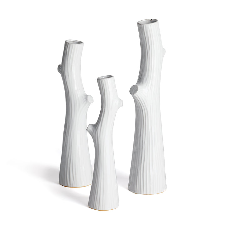 Three white ceramic faux bois vases with branch-shaped bodies and narrow openings, shown together on white - Modern Organic