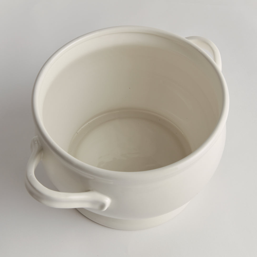 White ceramic footed bowl viewed from above, showing the empty interior, rounded rim and matching loop handles - Traditional