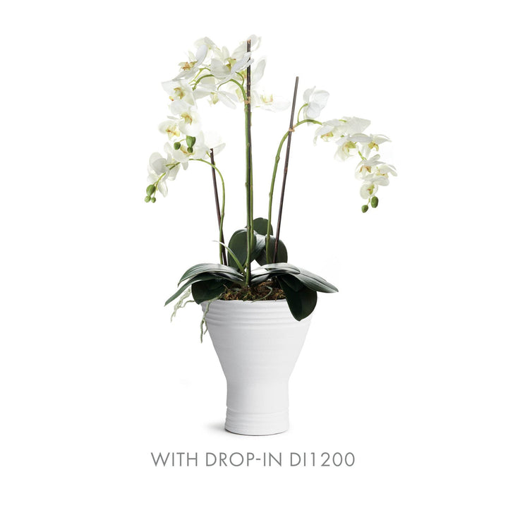 Short white ceramic vase styled with white orchid drop-in DI1200, matte finish and wide mouth for botanical styling – Modern Organic.

