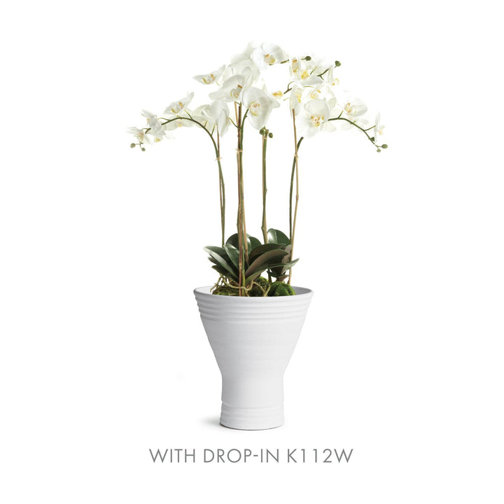Matte white ceramic vase with full white orchid drop-in K112W, styled for entry or tabletop focal points – Modern Organic.

