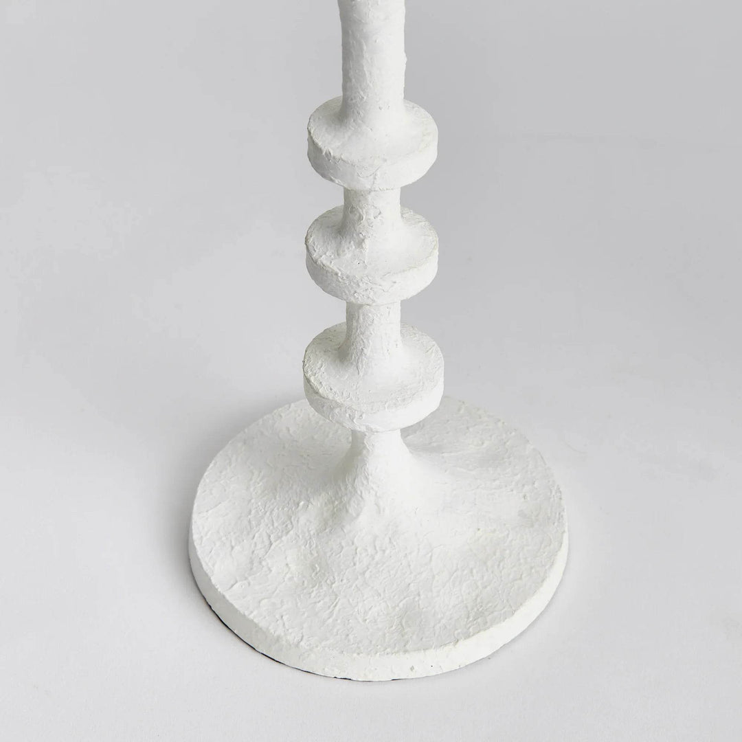Close-up of white candle stand stem with notched column design and matte finish, sculptural accent for modern farmhouse spaces – Modern Farmhouse.