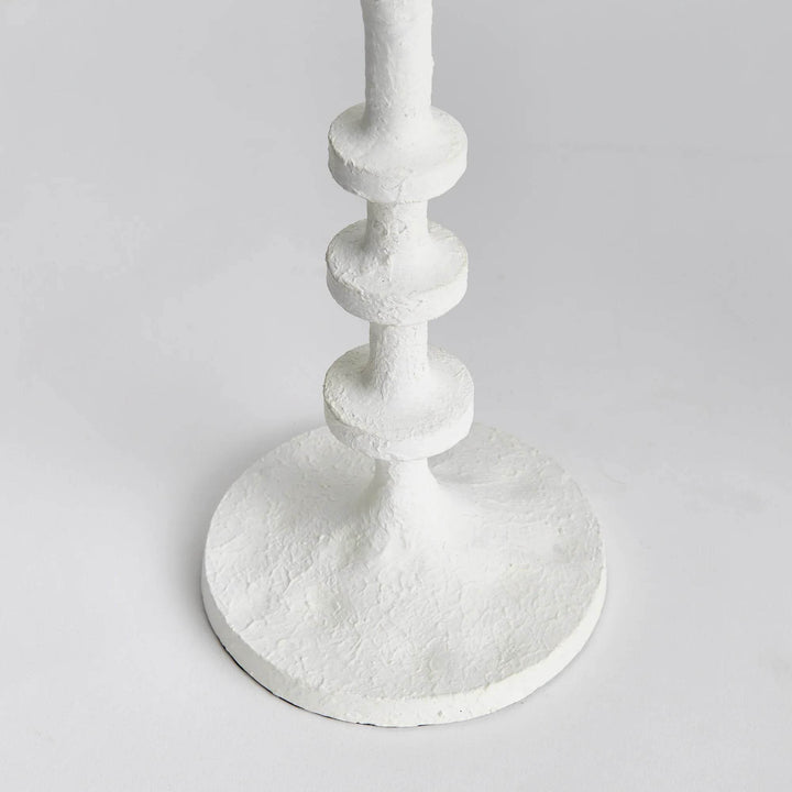 Close-up of white candle stand stem with notched column design and matte finish, sculptural accent for modern farmhouse spaces – Modern Farmhouse.
