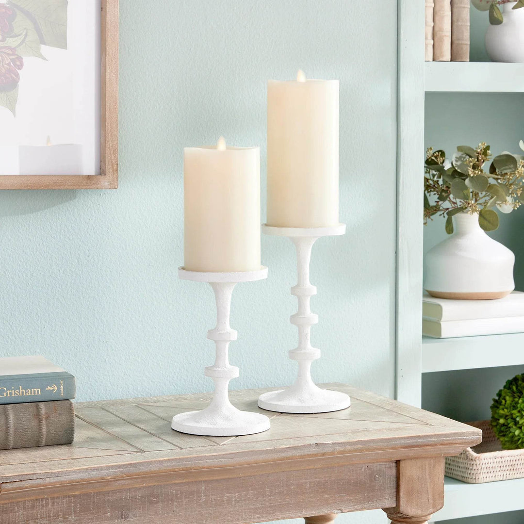 Pair of white petite candle stands styled on a wood shelf with decor accents, compact height ideal for modern farmhouse interiors – Modern Farmhouse.