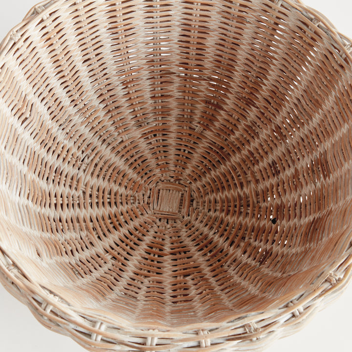 Whitewash rattan footed bowl viewed from above, showing its wide open interior and circular woven base - Coastal Transitional