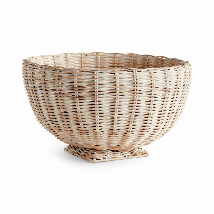 Whitewash rattan footed bowl with a rounded woven body and square pedestal, shown empty on plain white - Coastal Transitional