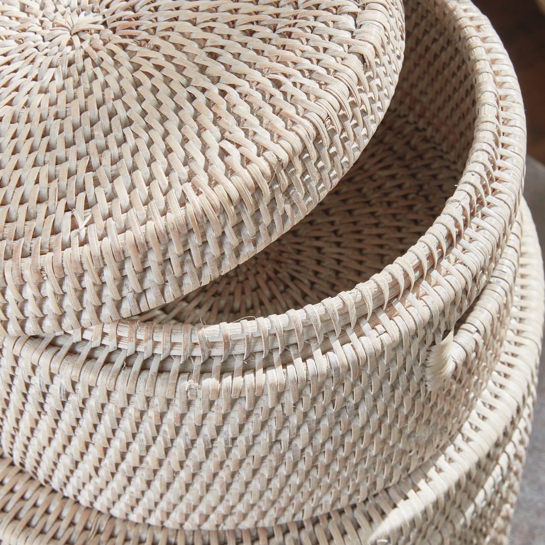 Close view of lifted whitewash rattan lid and box rim showing the tightly woven texture and fitted edge, Coastal Transitional