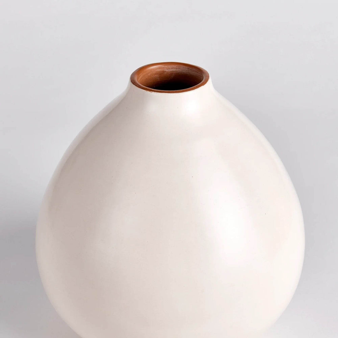 Neutral ceramic vase with wide base and tapered neck, natural clay interior visible – Modern Organic