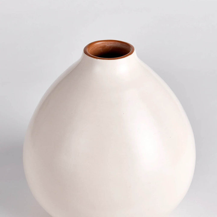 Neutral ceramic vase with wide base and tapered neck, natural clay interior visible – Modern Organic