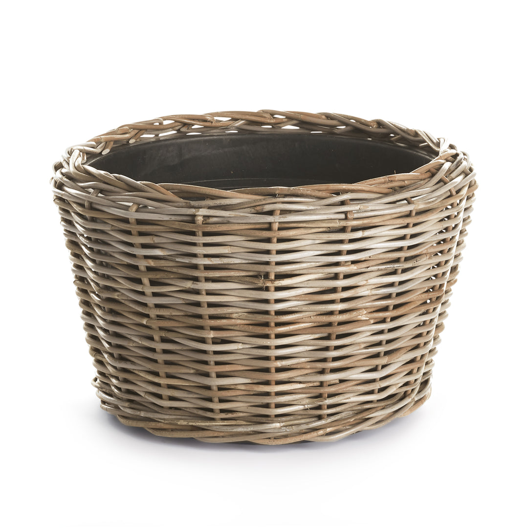 Woven rattan planter with recycled liner, shown from front in boho chic style
