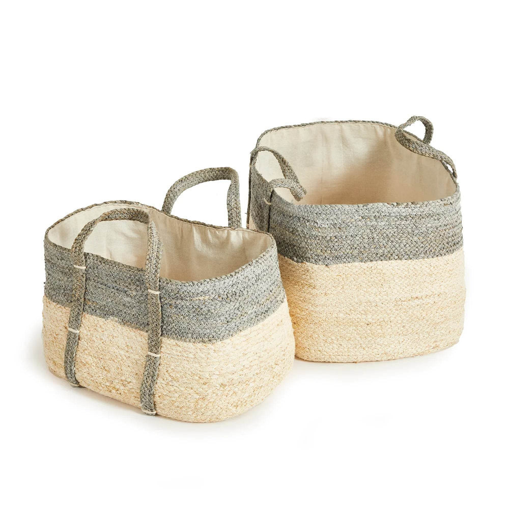 Woven rectangular storage baskets in a pair, featuring cotton liners and handles, neutral gray and beige colors for home organization.

