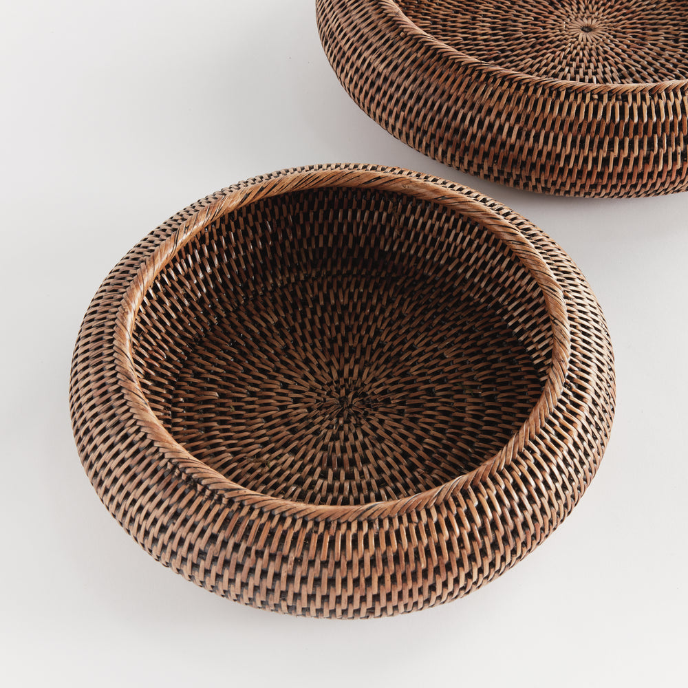 Brown rattan shallow display bowls viewed from above, showing circular woven bases and rounded rims - Coastal Transitional