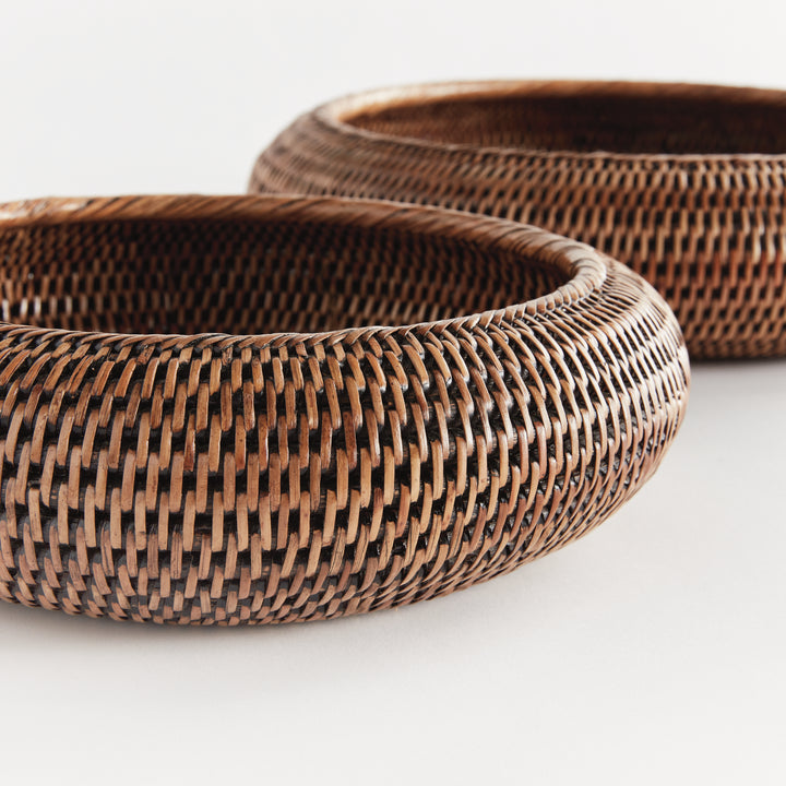 Brown rattan shallow display bowl set close-up showing the curved sides, fine woven strands and rims - Coastal Transitional